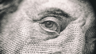 This is a zoomed in image of a $100 bill